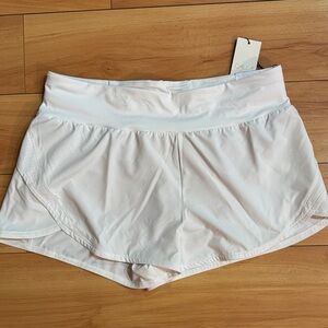 CALIA women’s pure white kick it up rid rise short